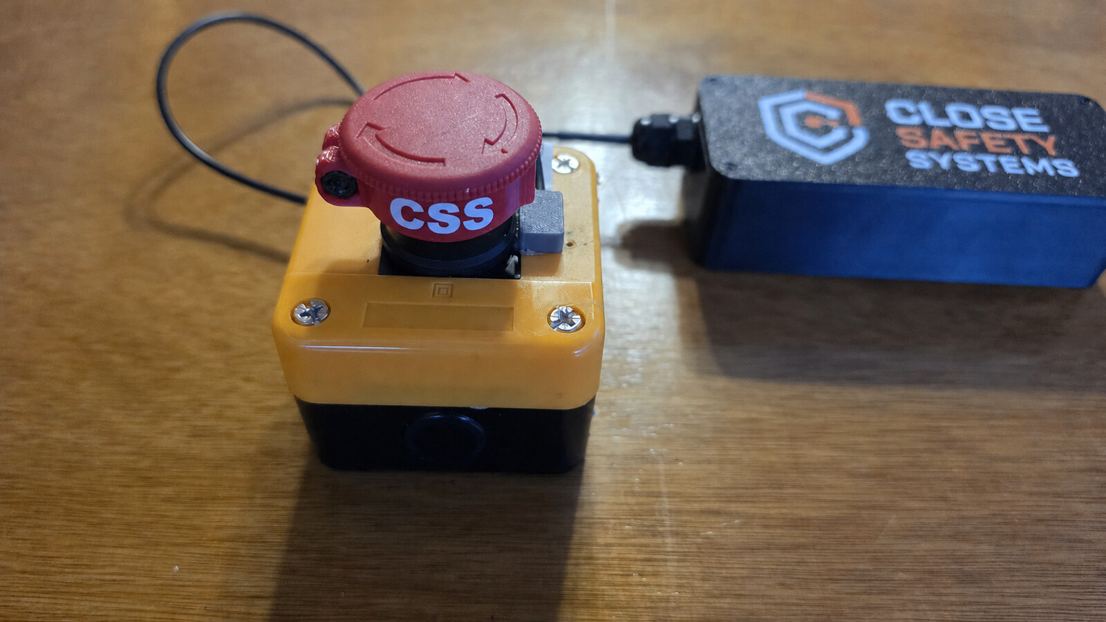 Current Close Safety Systems engineering demonstrator connected to an emergency stop